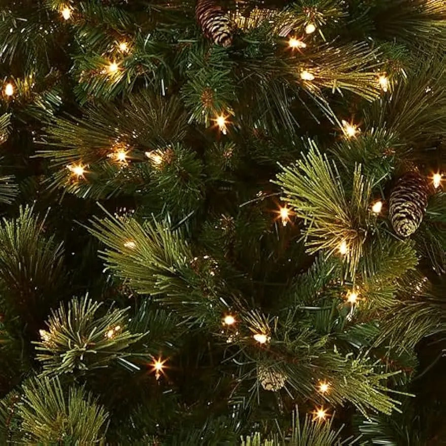 "Pre-Lit Artificial Christmas Tree with 750 Clear Lights, Pinecones, and 1399 Branches"